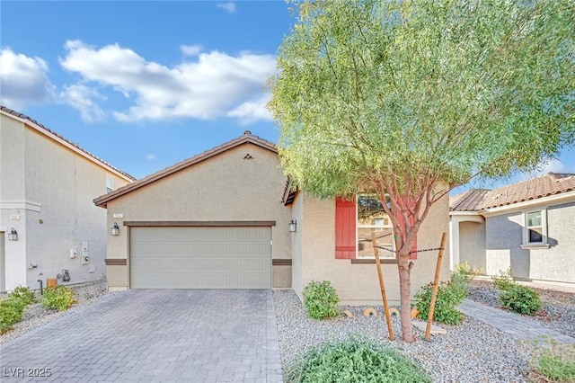 view of front of property with a garage