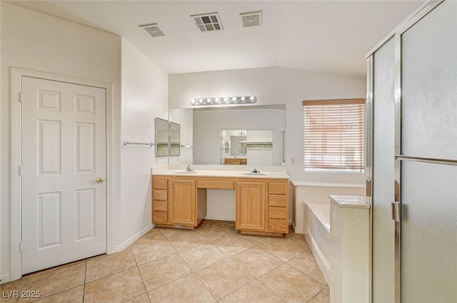 bathroom with lofted ceiling, vanity, independent shower and bath, and tile patterned floors