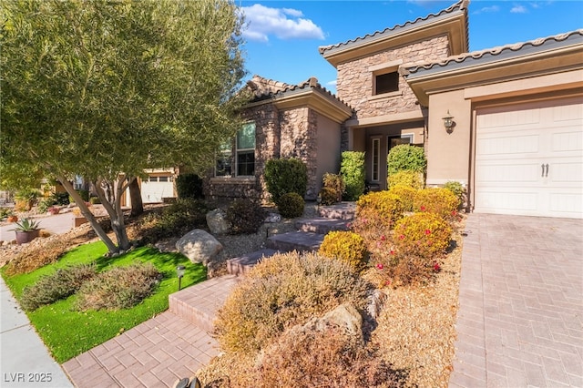 view of front of home featuring a garage