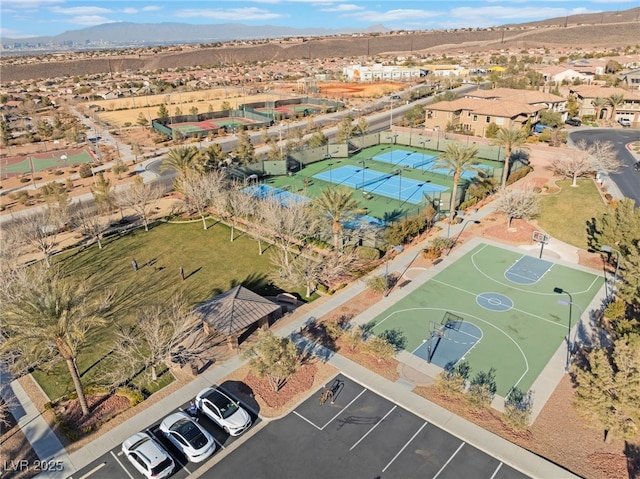 birds eye view of property featuring a mountain view