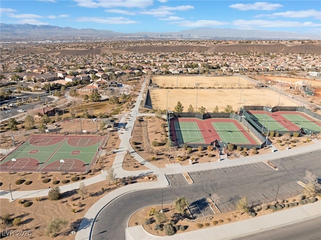 birds eye view of property featuring a mountain view