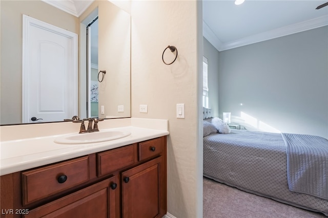 bathroom with vanity and crown molding