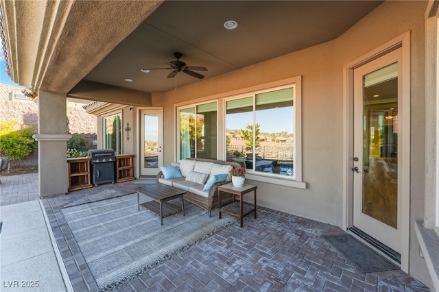 view of patio featuring an outdoor living space, grilling area, and ceiling fan