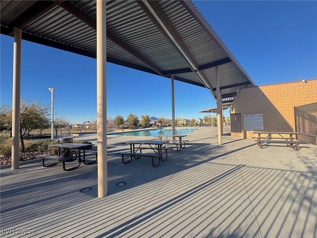 view of patio / terrace featuring a water view