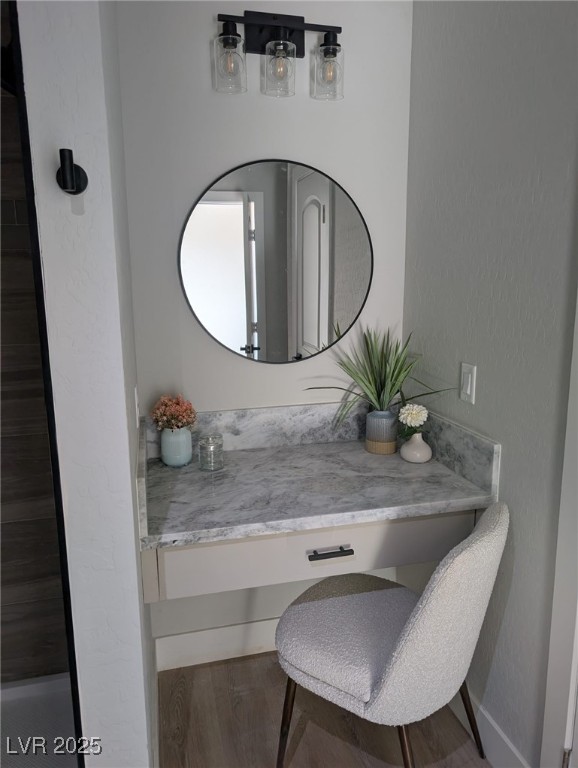 bathroom featuring vanity and wood-type flooring