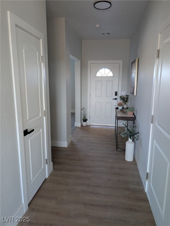 hall featuring dark hardwood / wood-style floors