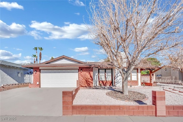 ranch-style house featuring a garage