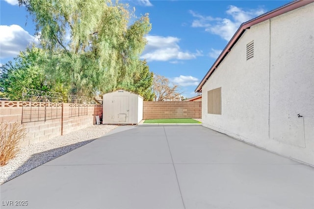 view of patio / terrace featuring a storage shed