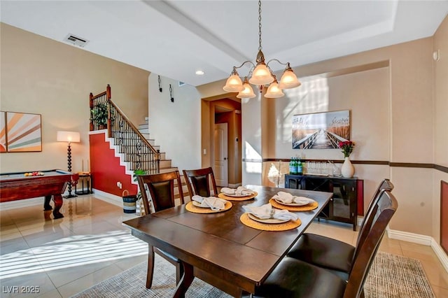 dining space with an inviting chandelier, billiards, and light tile patterned floors