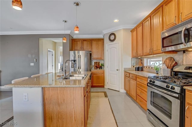 kitchen featuring stainless steel appliances, tasteful backsplash, a kitchen island with sink, and light tile patterned floors