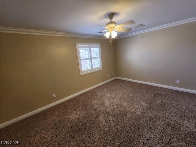 carpeted empty room with ceiling fan and ornamental molding