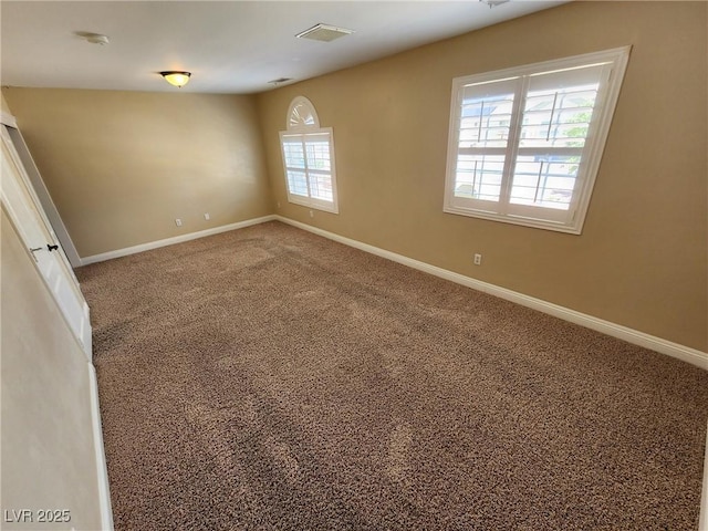 view of carpeted spare room