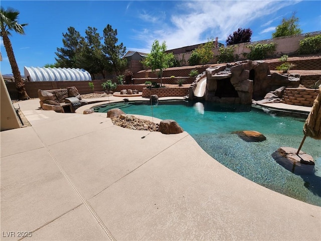 view of pool featuring a patio