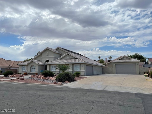 view of front of property featuring a garage