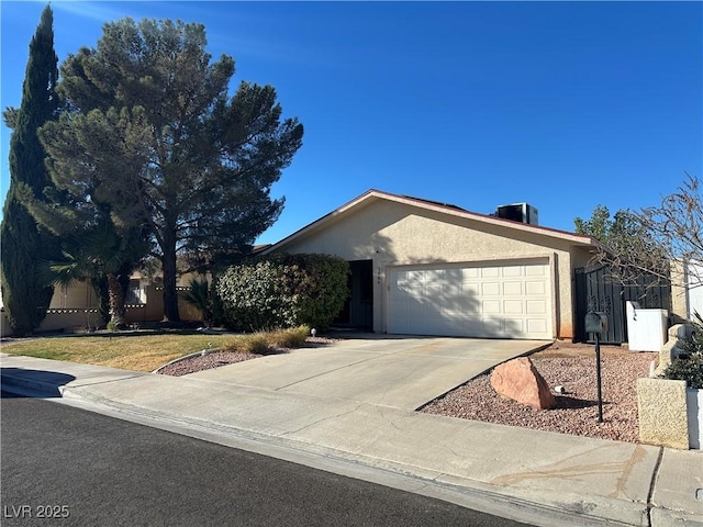 single story home featuring a garage