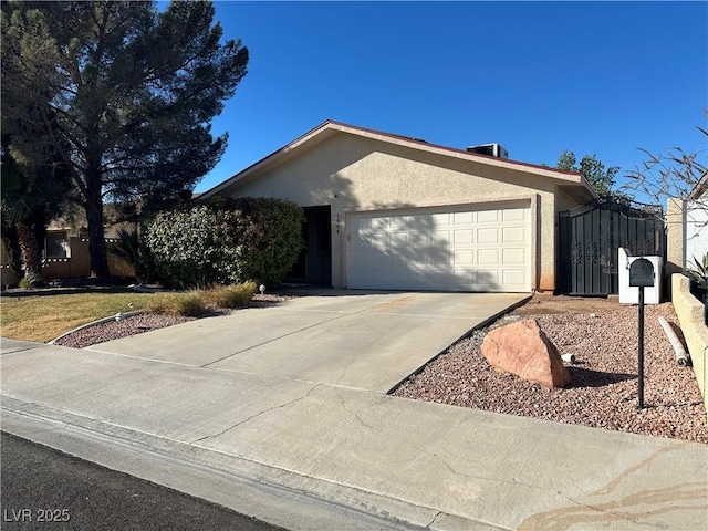 single story home featuring a garage