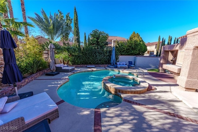 view of pool featuring an in ground hot tub and a patio area