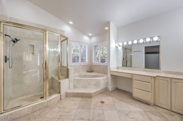 bathroom with independent shower and bath, lofted ceiling, and vanity