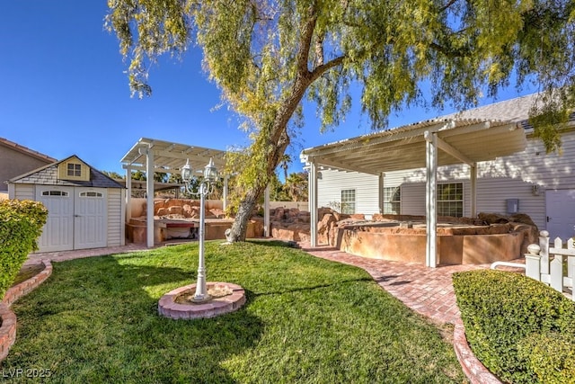 view of yard featuring a pergola, a patio, and a storage unit