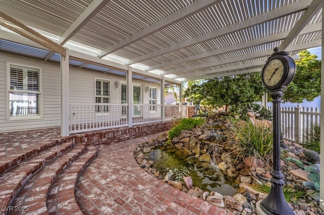 view of patio / terrace featuring a pergola