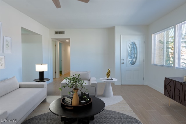 living room with light hardwood / wood-style flooring