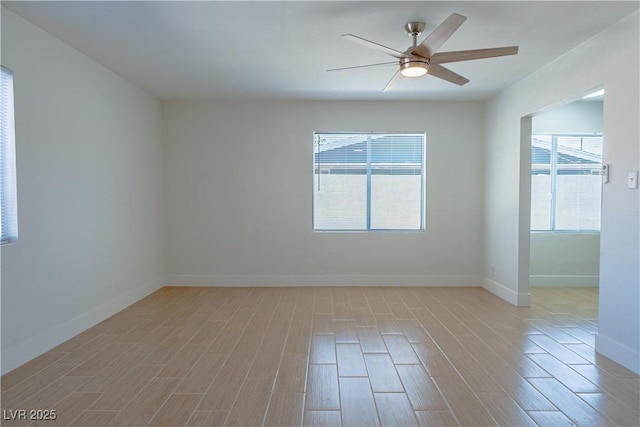 unfurnished room with ceiling fan