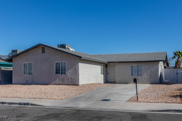 ranch-style home with central air condition unit