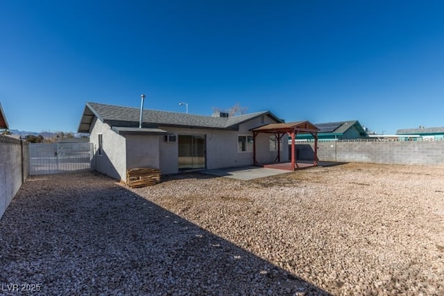 rear view of house featuring a patio area