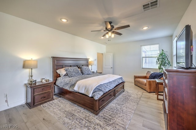 bedroom with ceiling fan and light wood-type flooring