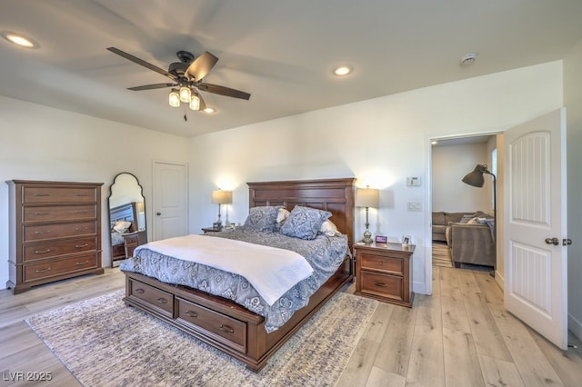 bedroom featuring ceiling fan and light hardwood / wood-style flooring