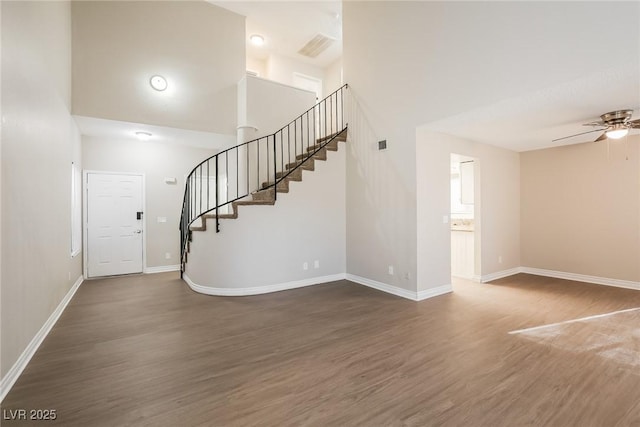 entryway with ceiling fan and dark hardwood / wood-style floors