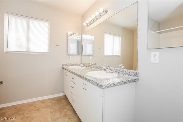 bathroom with tile patterned flooring and vanity