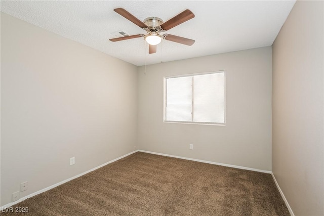 unfurnished room with ceiling fan, carpet, and a textured ceiling