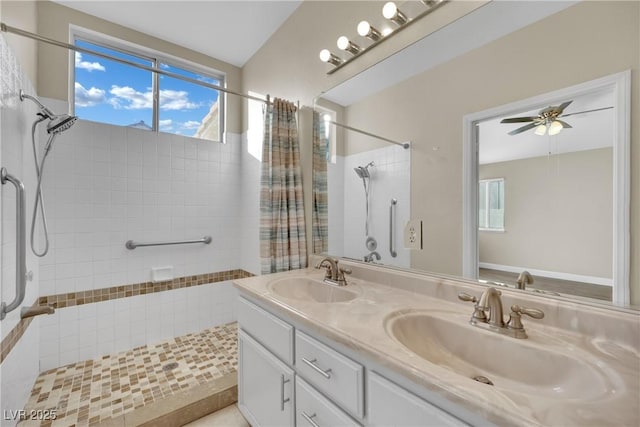 bathroom with ceiling fan, vanity, and a shower with curtain