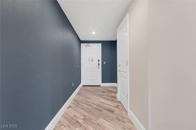 hallway with light wood-type flooring