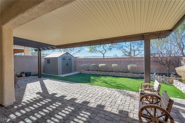 view of patio / terrace with a storage shed