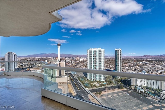 balcony featuring a mountain view