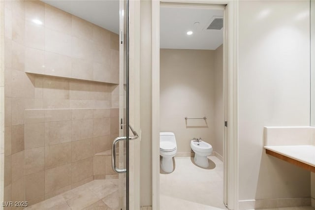 bathroom featuring a bidet, toilet, walk in shower, and vanity