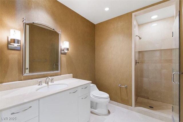 bathroom featuring toilet, vanity, tile patterned flooring, and an enclosed shower