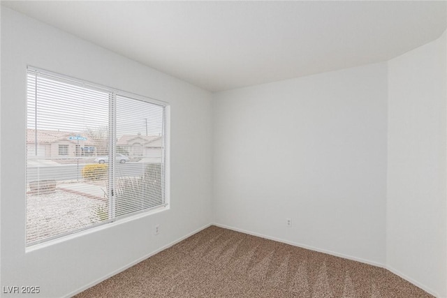 view of carpeted spare room