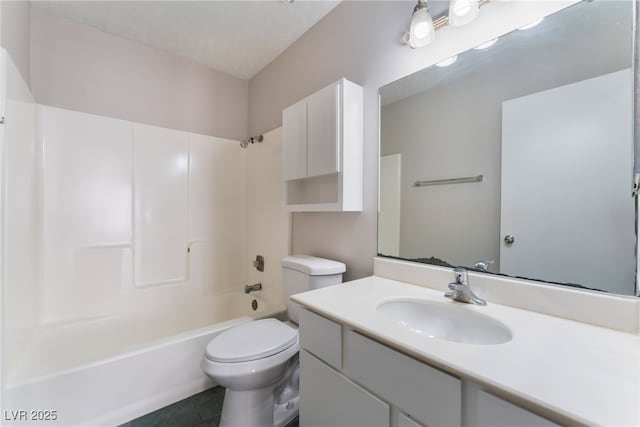 full bathroom with tile patterned flooring, shower / tub combination, vanity, and toilet