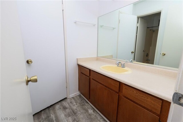 3790 Desert Marina Dr Unit 147, Laughlin, NV 89029 - bathroom featuring vanity, wood finished floors, and a shower