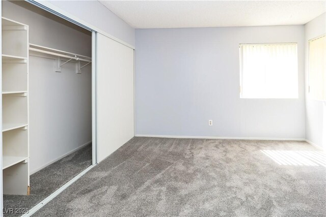 3790 Desert Marina Dr Unit 147, Laughlin, NV 89029 - unfurnished bedroom featuring carpet flooring and a closet