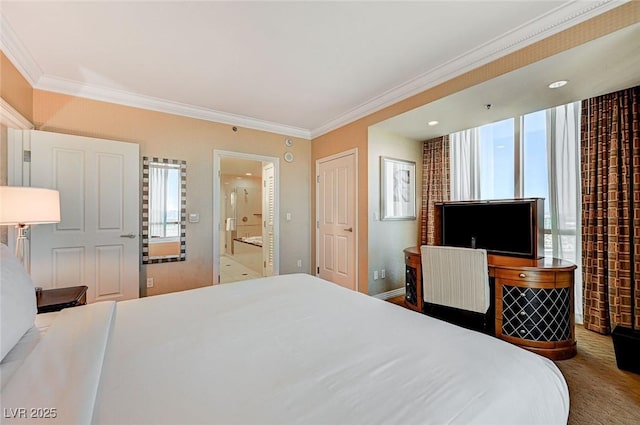 bedroom with ensuite bathroom, ornamental molding, and multiple windows