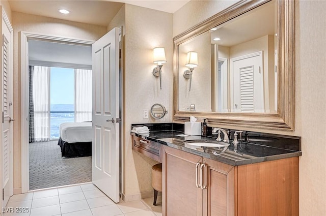 bathroom featuring tile patterned floors and vanity