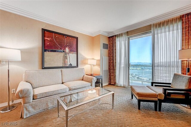 living area with ornamental molding