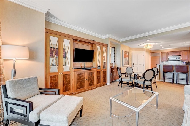 living room featuring crown molding