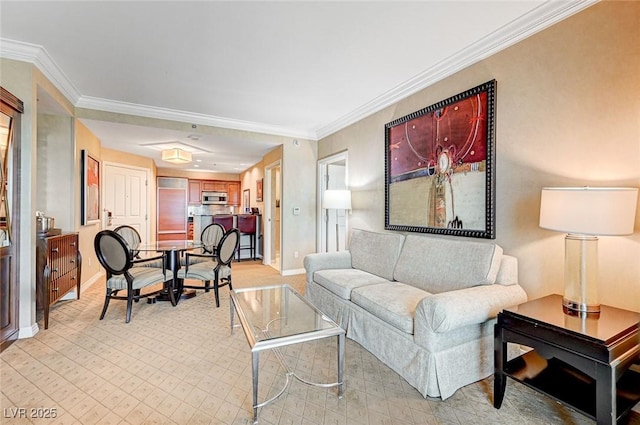 living room featuring crown molding