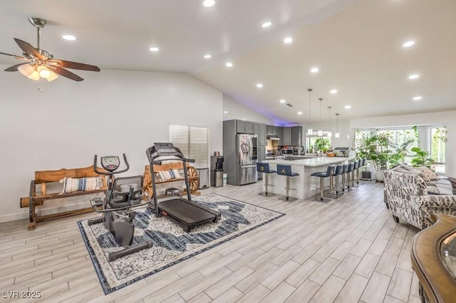 living room with vaulted ceiling and ceiling fan