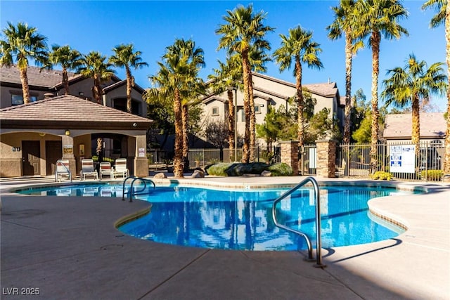 view of swimming pool featuring a gazebo and a patio area